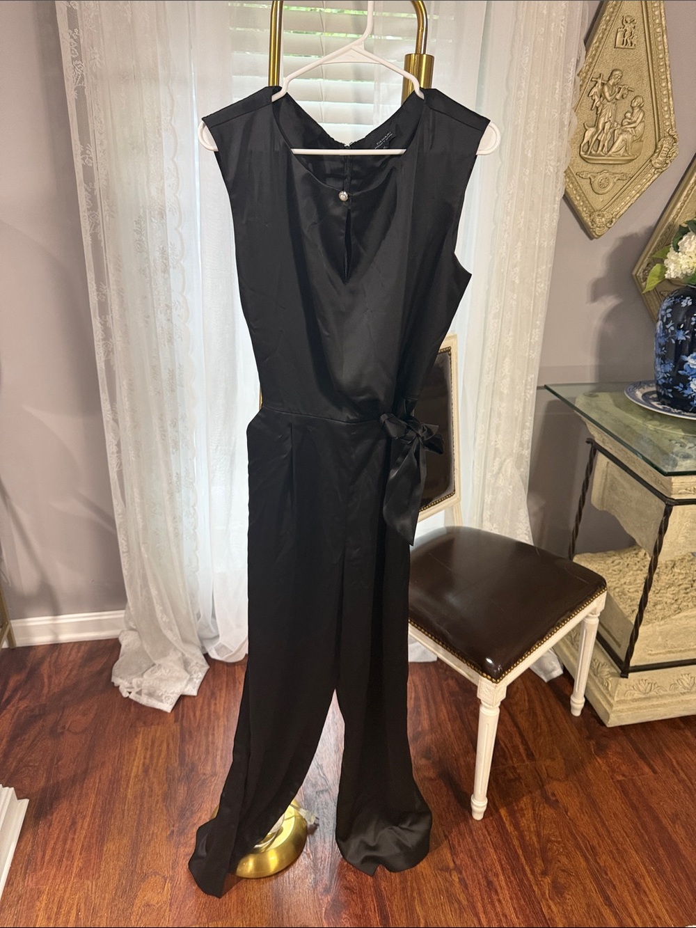 Sleek Black Sleeveless Satin Jumpsuit with Side Tie